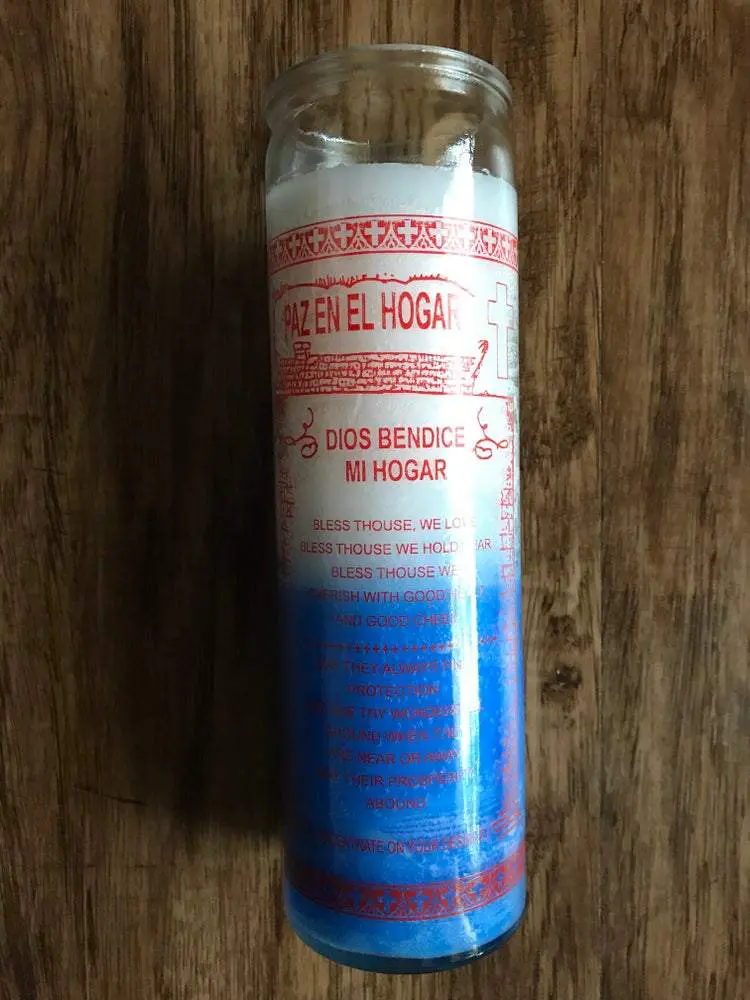 Blue and white candle with Spanish text. Blue and white candle with Spanish text.