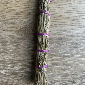 Dried lavender bundle tied with purple ties.