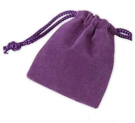 Purple velvet drawstring bag with a cord. Purple velvet drawstring bag with a cord.