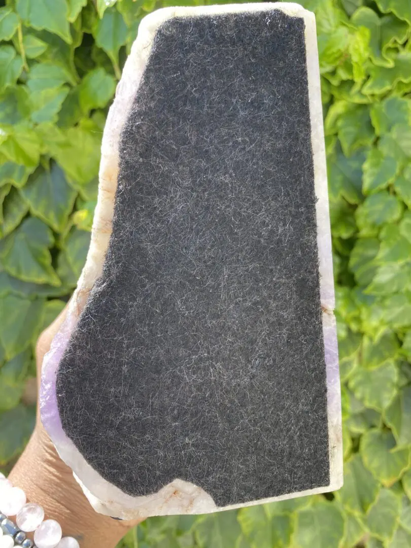 Bottom of a purple amethyst crystal. Bottom of a purple amethyst crystal.