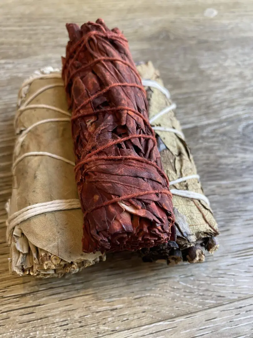 Two bundles of sage smudge sticks. Two bundles of sage smudge sticks.