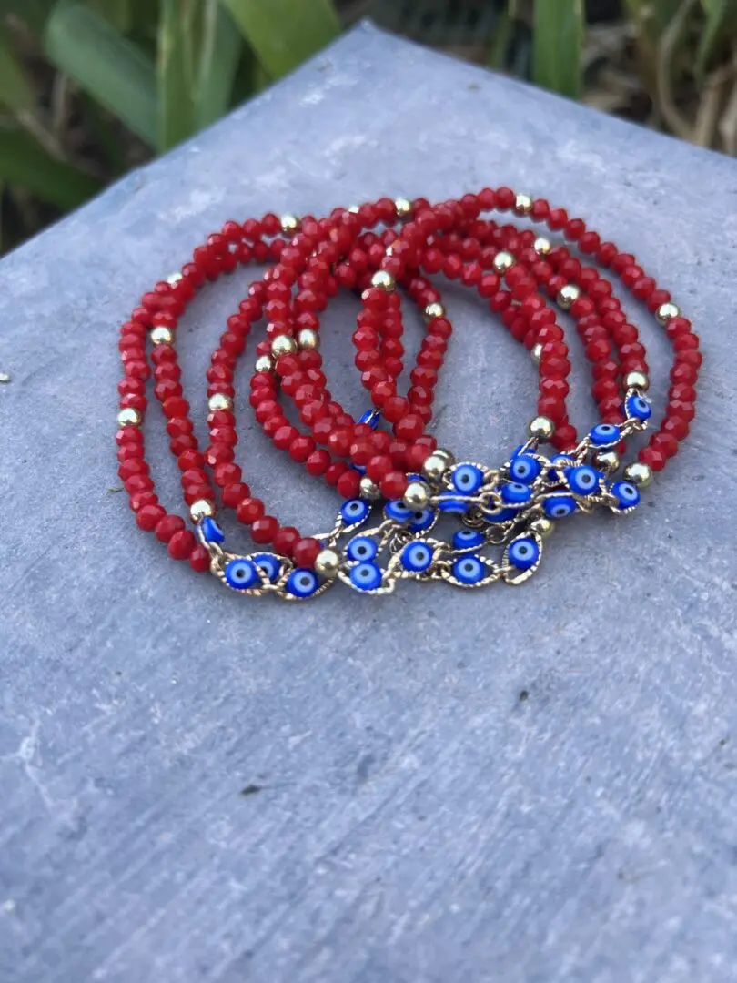 A close up of a necklace on some wood A close up of a necklace on some wood