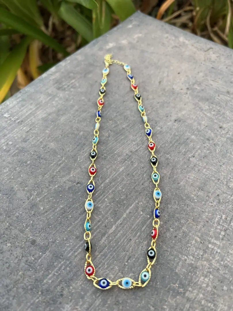 A close up of a necklace on a table A close up of a necklace on a table