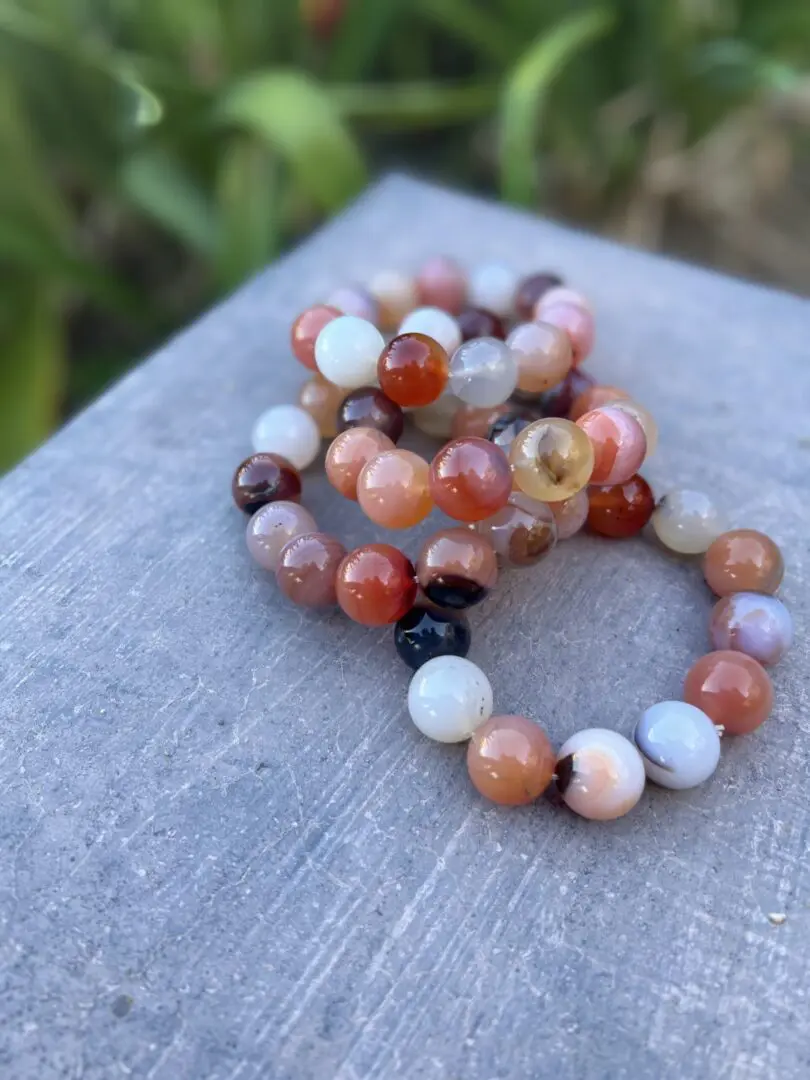 A close up of a necklace on a table A close up of a necklace on a table