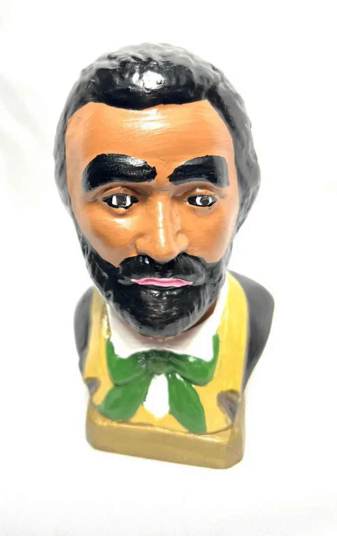 A close up of the face of a man in a bib A close up of the face of a man in a bib