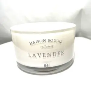 A candle that is sitting on top of a table.