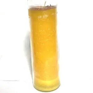 A candle that is in the shape of a glass.