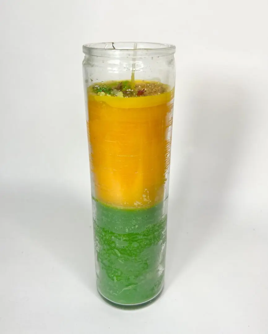 A candle that is sitting on the table. A candle that is sitting on the table.