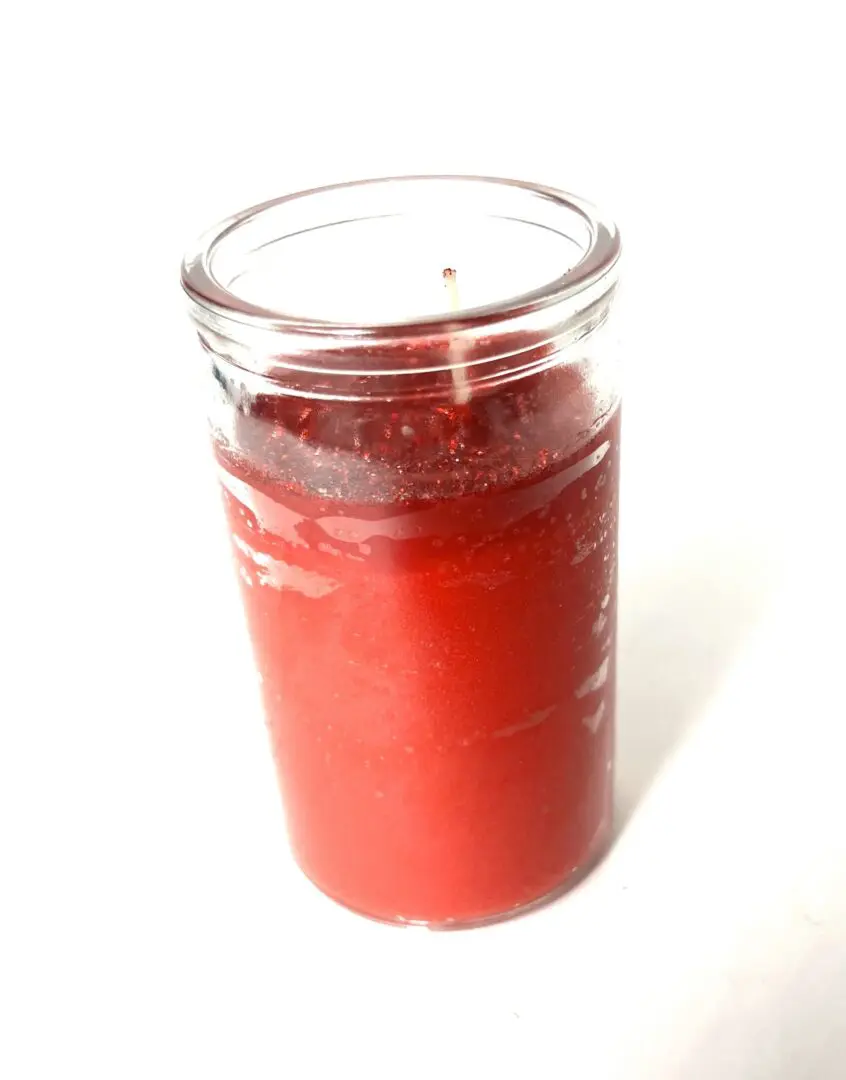 A candle that is sitting on the table. A candle that is sitting on the table.