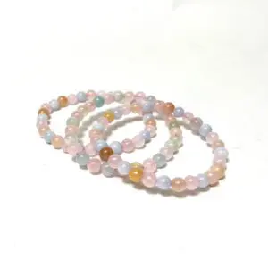 A set of three bracelets that are all different colors.