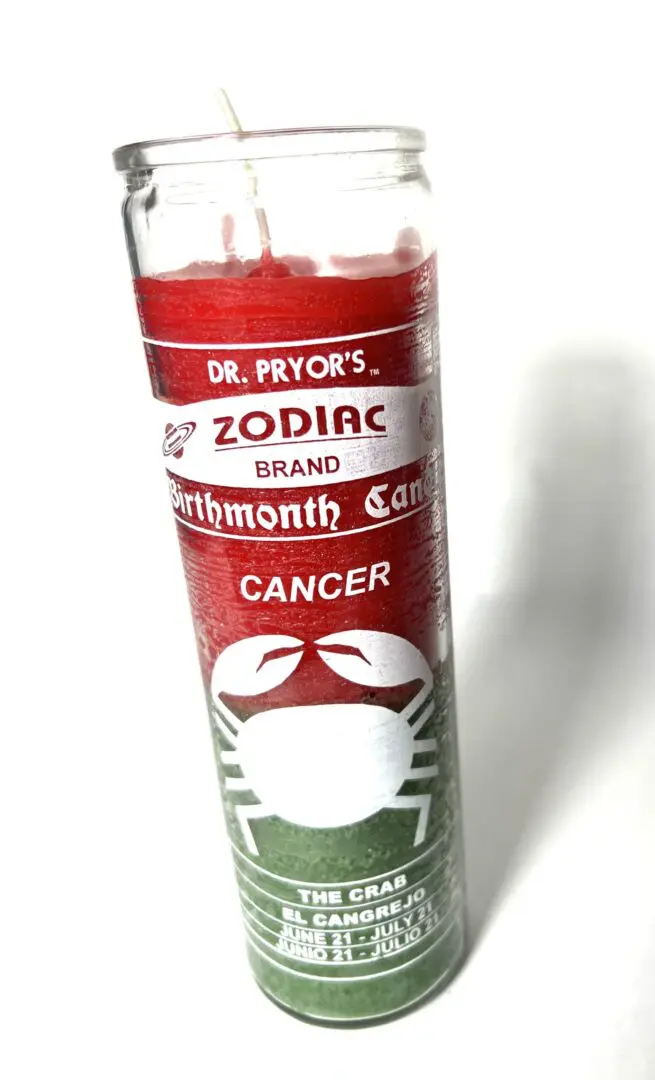 A candle that has the zodiac signs on it. A candle that has the zodiac signs on it.