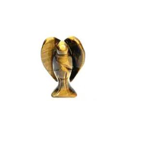 A gold bird statue sitting on top of a white table.