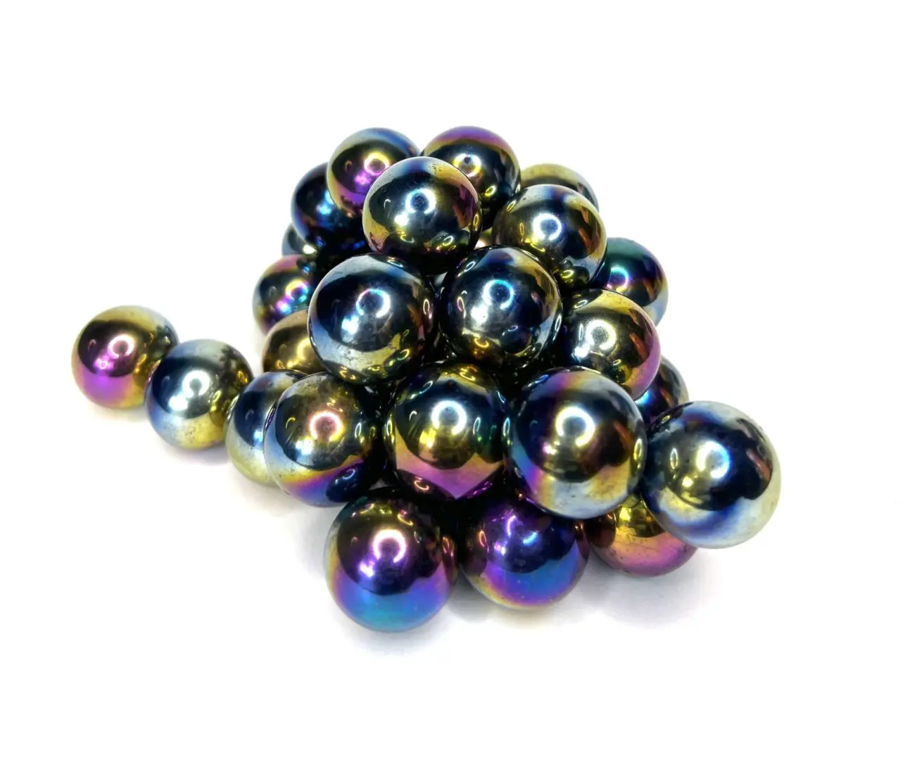 A bunch of colorful balls are stacked on top of each other A bunch of colorful balls are stacked on top of each other