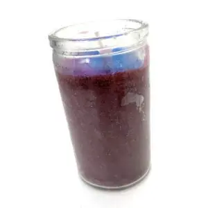 A candle that is sitting on the table.