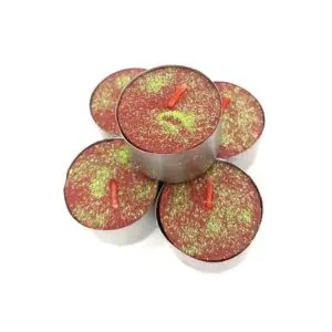 A group of six candles that are sitting on top of each other.