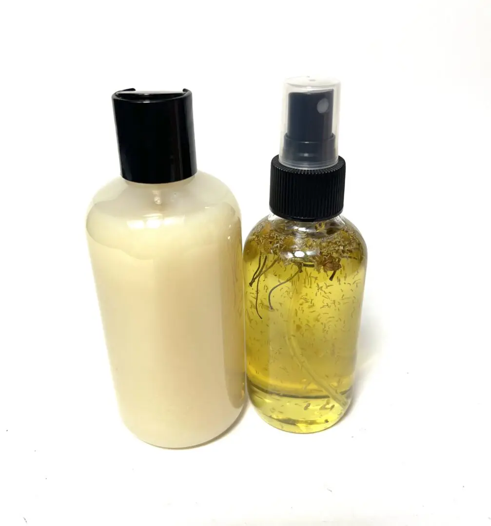 Two bottles of hair products sitting next to each other. Two bottles of hair products sitting next to each other.