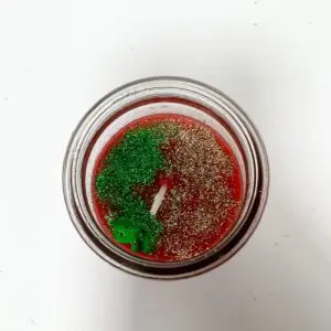 A candle that is sitting on the table.