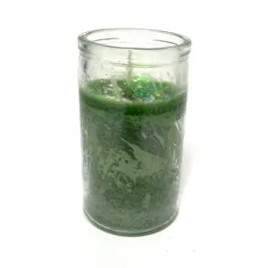 A candle that is sitting in a glass.