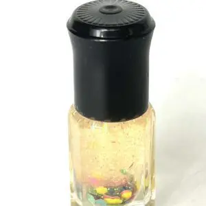 A bottle of nail polish with pills inside.