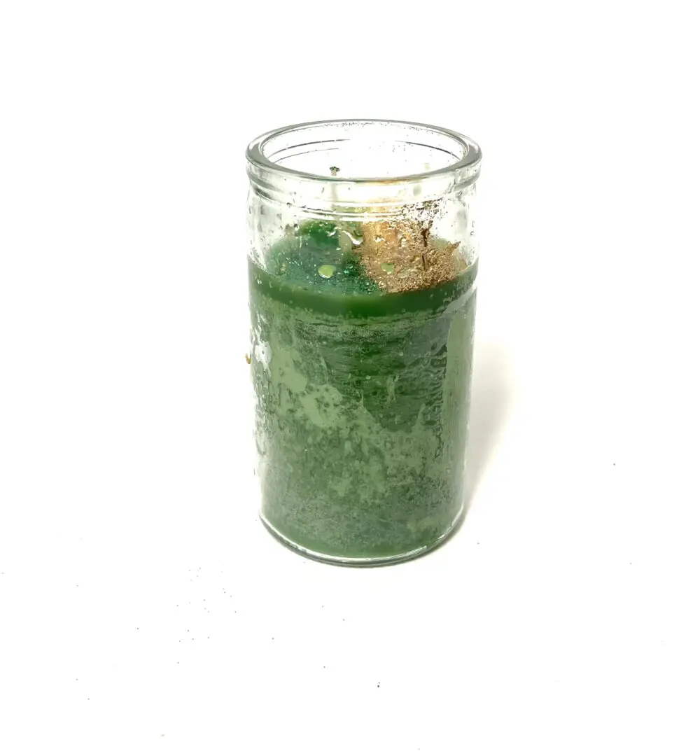 A candle that is sitting on the table. A candle that is sitting on the table.