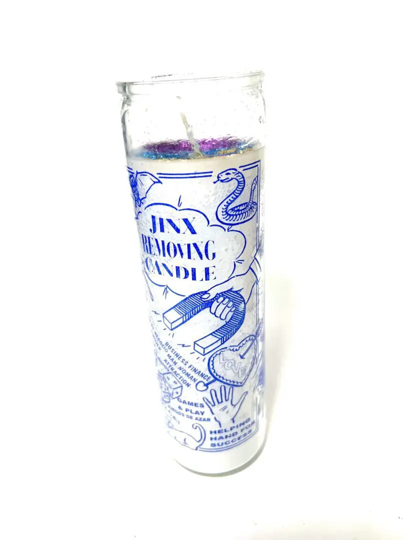 A candle that is sitting on the table. A candle that is sitting on the table.