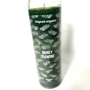 A candle that is sitting on the ground.