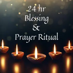 A group of candles that are lit on the ground.