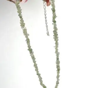 Delicate pale green beaded necklace with adjustable chain clasp.