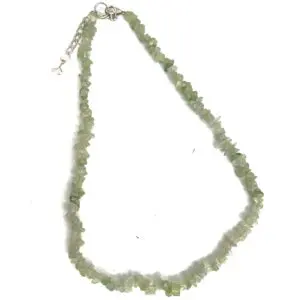 A necklace made of rough, translucent greenish beads.