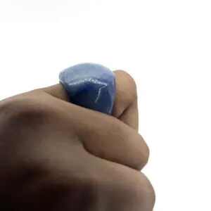Hand squeezing a blue stress ball.