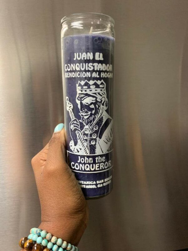 Purple candle with image of John the Conqueror.