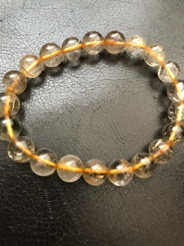 Golden rutilated quartz beaded bracelet.