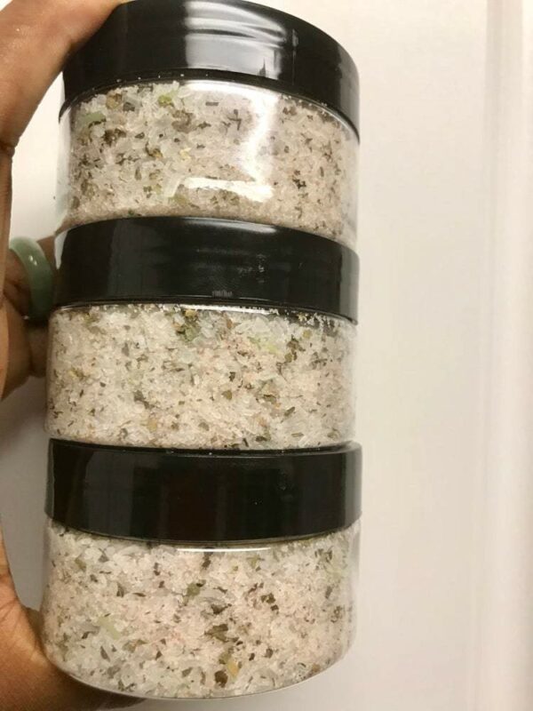 Three jars of pink bath salts.