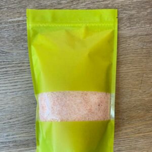 Pink Himalayan salt in a green bag.