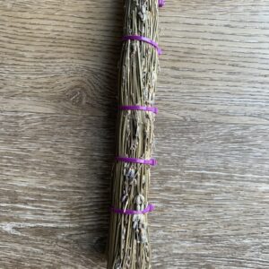 Dried lavender bundle tied with purple ties.