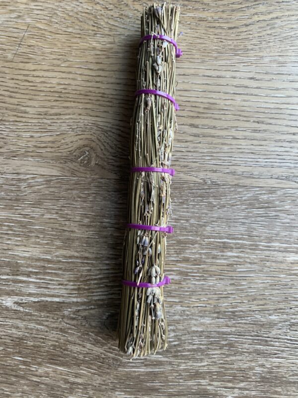 Dried lavender bundle tied with purple ties.