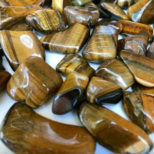 Polished brown and gold tiger's eye stones.