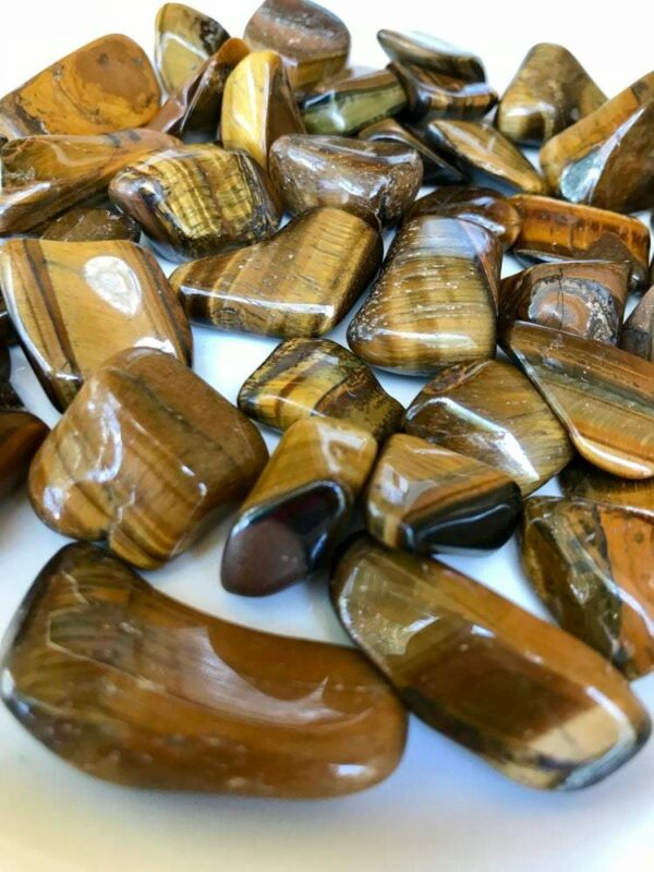 Polished brown and gold tiger's eye stones.