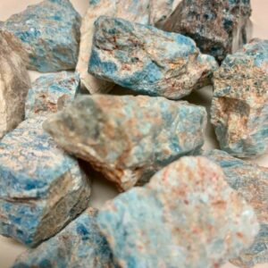 Blue apatite crystal raw rough stones.