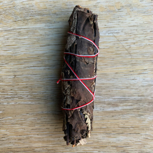 Dried herbs bundle tied with string.