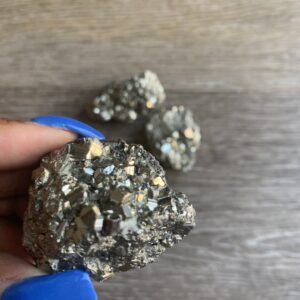 Close up of a pyrite crystal cluster.