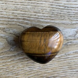 Heart shaped tiger's eye gemstone.