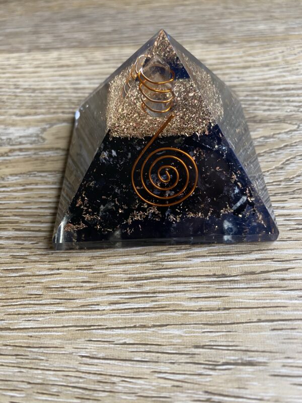 Black obsidian crystal pyramid with wire.