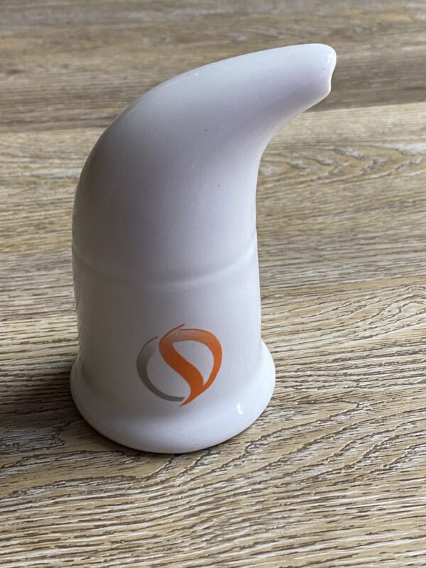 White ceramic nasal inhaler with logo.