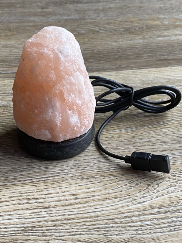 Pink Himalayan salt lamp with cord.