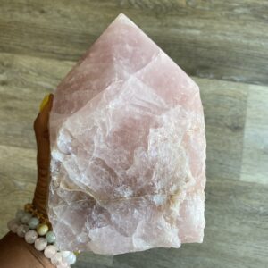 Large pink rose quartz crystal.