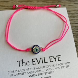 Pink evil eye bracelet with charm.