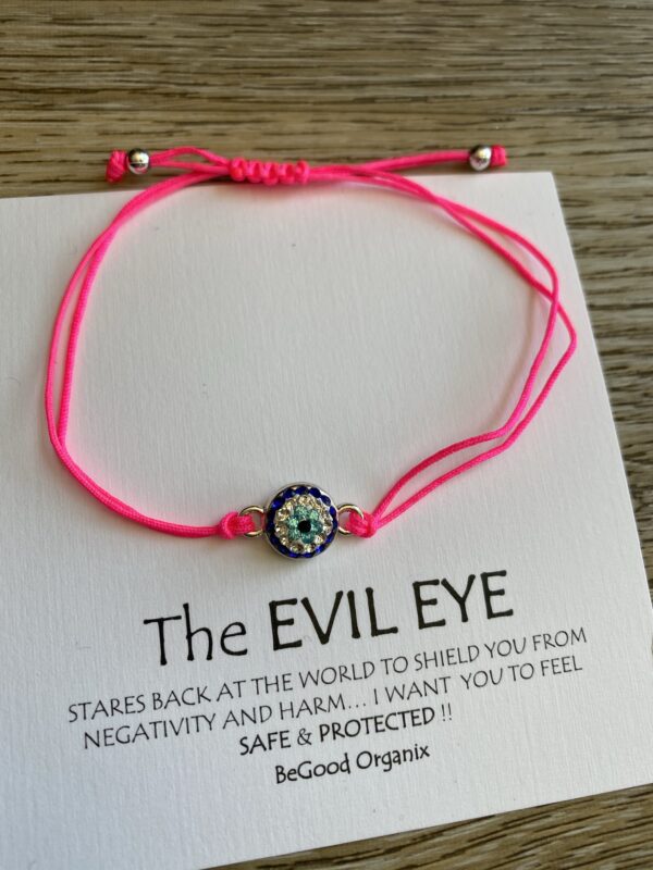 Pink evil eye bracelet with charm.