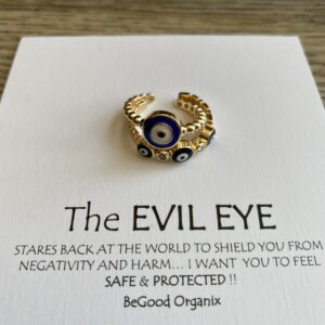 Gold evil eye ring with diamonds.