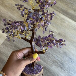 Amethyst crystal tree with gold wire.